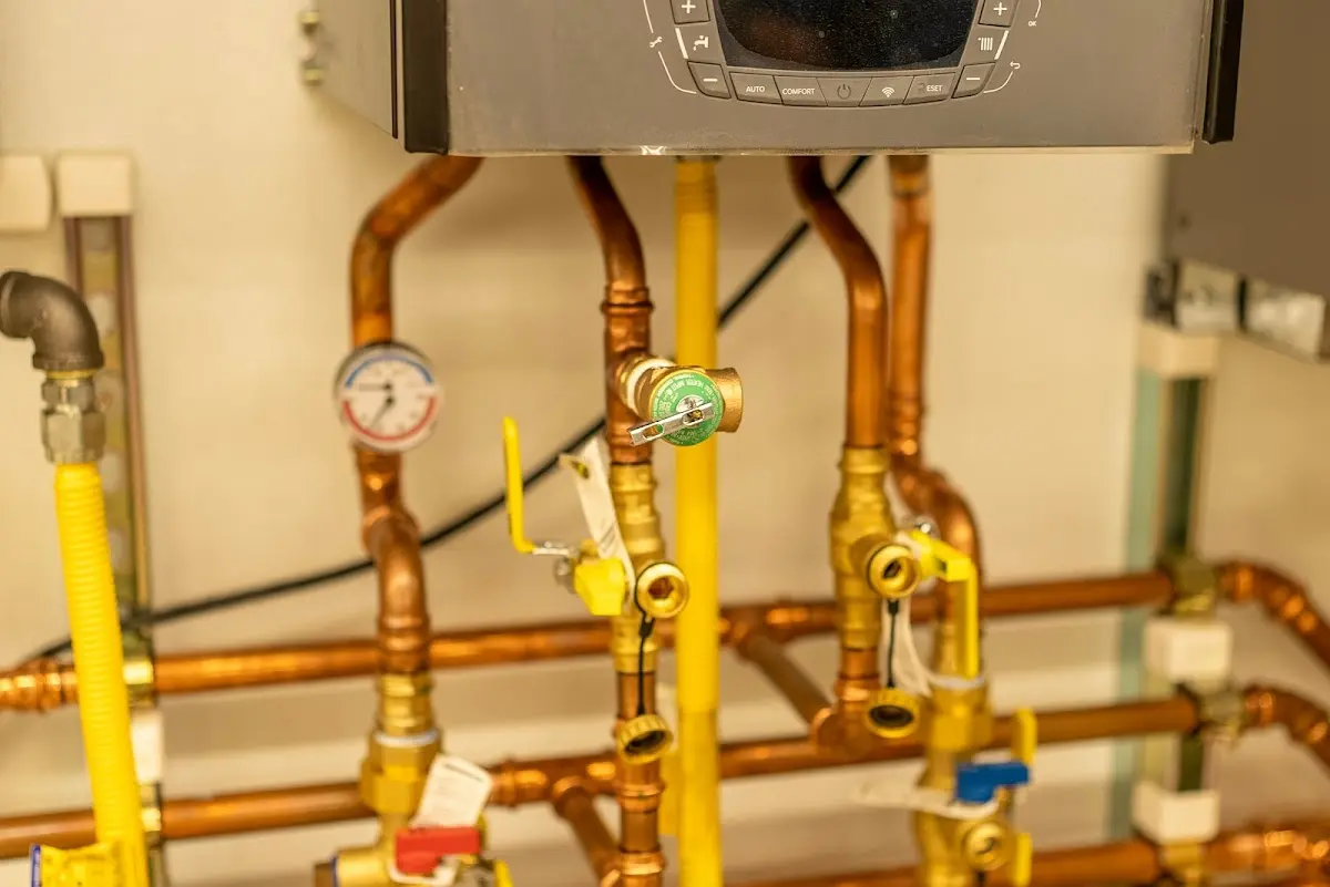 Licensed technician providing Water Heater Installation for a homeowner in Hermantown